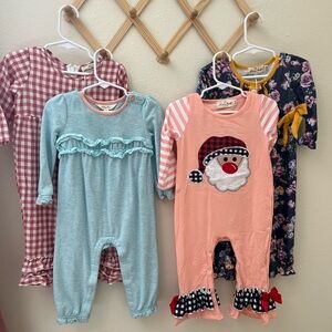 Four Baby Jumpsuits